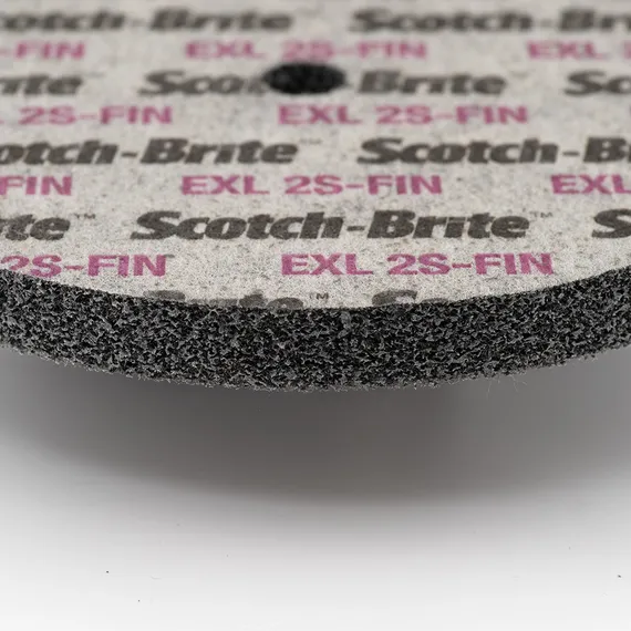 Круг Scotch-Brite 3M EXL 2S-FIN 150x13x13 мм фотография вблизи